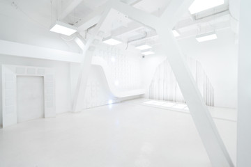 Abstract futuristic empty room interior in white with illumination and geometric decoration on the walls