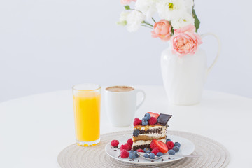 healthy dessert with different berries on white background