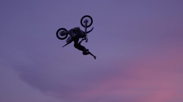 Extreme Sport Motocross freestyle backflip on big jump