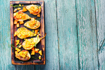Ripe baked pear with pumpkin