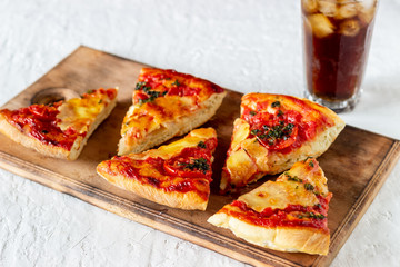 Italian pizza with tomatoes and mozzarella cheese. Italian cuisine. Margherita.