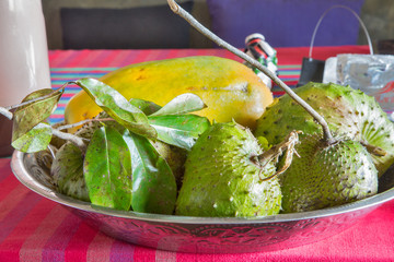 Exotic fruits lie on a platter.Horizontally.