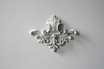 White wall molding with geometric shape and vanishing point. Luxury white wall design bas-relief...