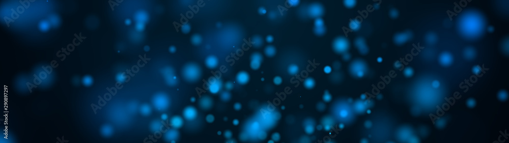Poster computer generated plenty of blue spots big and small with bokeh on a black background. widescreen 3