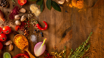 Wooden background with spices, food concept