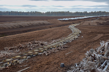 autumn landscape with railroad tracks in peat bog Zilaiskalns, Latvija