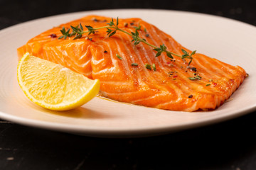 Prepared fish steak on plate, food close-up