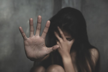 Stop sexual harassment and violence against women, rape and sexual abuse concept,  STOP gesture with hand, Stop drugs,  human rights violations, human trafficking, Copy space.