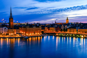 Naklejka na ściany i meble Stockholm, Sweden The city skyline at dawn over Riddarfjarden and the Old Town.