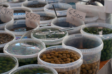 box with olives for sale at local market