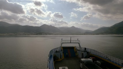 View from bow of cruise ship. Sailboat sailing in Mediterranean sea. Greece. 4K