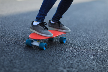 Skateboarder skateboarding on highway road