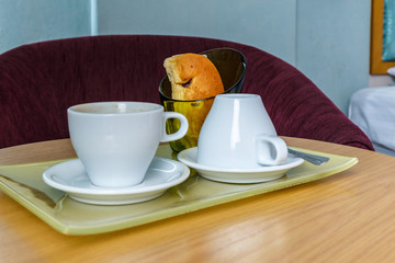 cup of coffee on wooden table
