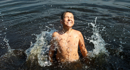 Boy having fun in the water.