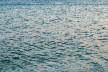 Blue sea soft waves, natural texture, isolated nature background