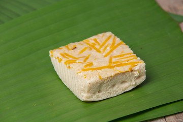 World Food Day concept, colorful sweet Thai dessert placed on a banana leaf.