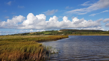 landscape with lake and blue sky