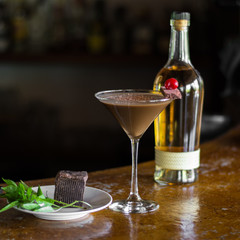 cocktail espresso martini with bottle glass and chocolate