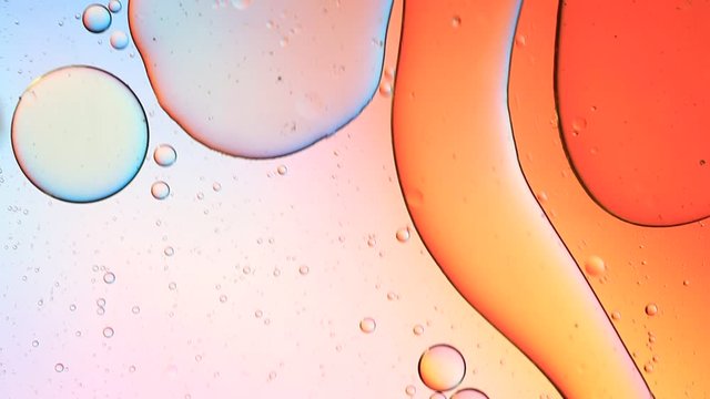 Colorful artistic image of oil drop on water for modern and creation design background.