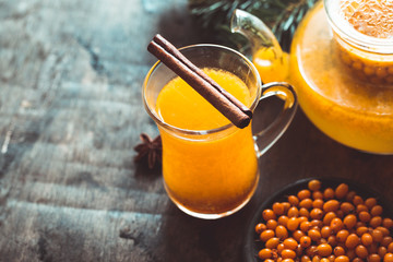 Autumn or winter sea buckthorn drink. Sea Buckthorn tea, selective focus. Still life, food and...