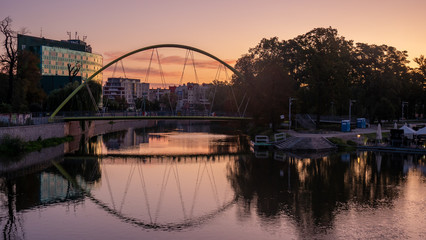 Fototapeta na wymiar The Malt Footbridge Kladka Slodowa at sunrise, Wroclaw, Poland.