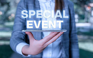 Word writing text Special Event. Business photo showcasing Function to generate money for non profit a Crowded Occassion Outdoor scene with business woman holds lap top with touch screen