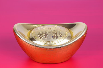 Golden chinese traditional money on red color background. Representing rich, wellness, properity, lucky, happiness for Chinese New Year celebration