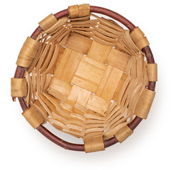 Obraz premium Beautiful wicker basket. Craftsman and handmade at home. Top view. Isolated on white background