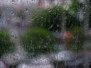 Background texture rain poured on the window glass