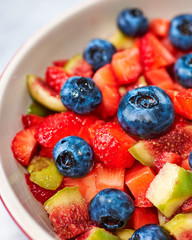 fig strawberry blueberry fruit salad, concept diet and healthy eating