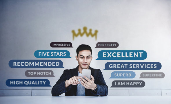 Customer Experiences Concept. a Young Happy Man Reading Positive Review Rating via Smartphone. Client's Satisfaction Surveys Online