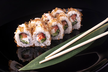 Japanese Sushi Rolls with Cream Cheese and eel shavings