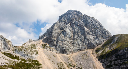 Close view on western wall of Mangart (2677m), Mountain in the Julian Alps. Taken from Mangart Saddle, sedlo. Border between Slovenia and Italy.