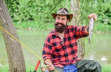 The best time for fishing. Successful fishing. summer weekend. man with great fish catch. mature...
