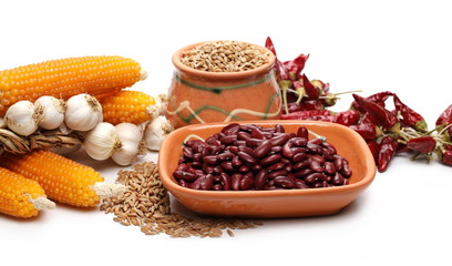 Autumn, fall foods with clay pot, bowl isolated on white background