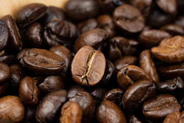 Roasted coffee beans background, Close Up mixture of different kinds of coffee beans.