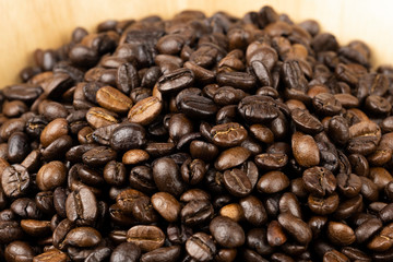 Roasted coffee beans background, Close Up mixture of different kinds of coffee beans.