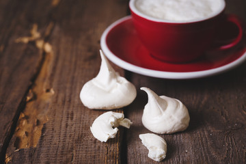 mouth-watering meringue on a wooden background