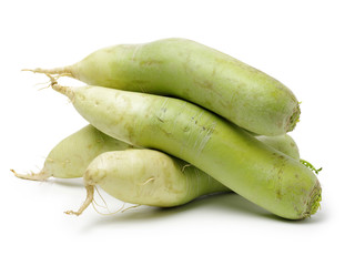 Whole single green radish on white background.