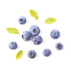 Blueberries with leaves isolated on white background, top view