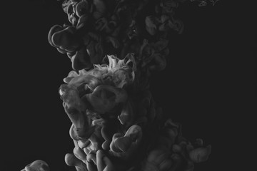 Ink in water tank with black background