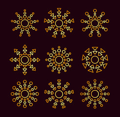 Golden ethnic sun icons with different geometric rays. Gold summer symbols with gradient. Line sunlight signs on dark background. Vector illustration
