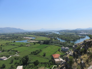 Fertile plains in valley with river 