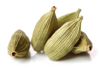 Green cardamom pods. Food, heap.