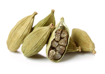 Green cardamom pods. Food, heap.