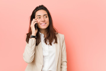 Young caucasian woman talking on the phone