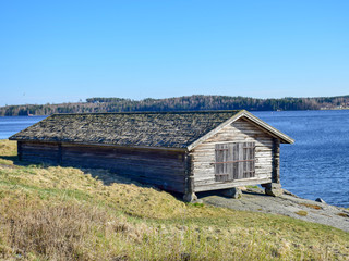 old wooden shed with wooden roof