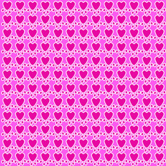 Pink heart shape on pink background.Many hearts are arranged in a pattern on a beautiful, bright pink background.