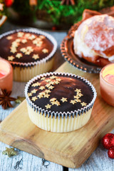 Chocolate Christmas cookies decorated with tiny edible stars.