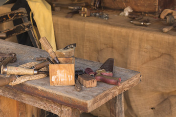 Wooden tools on a work table in a workshop